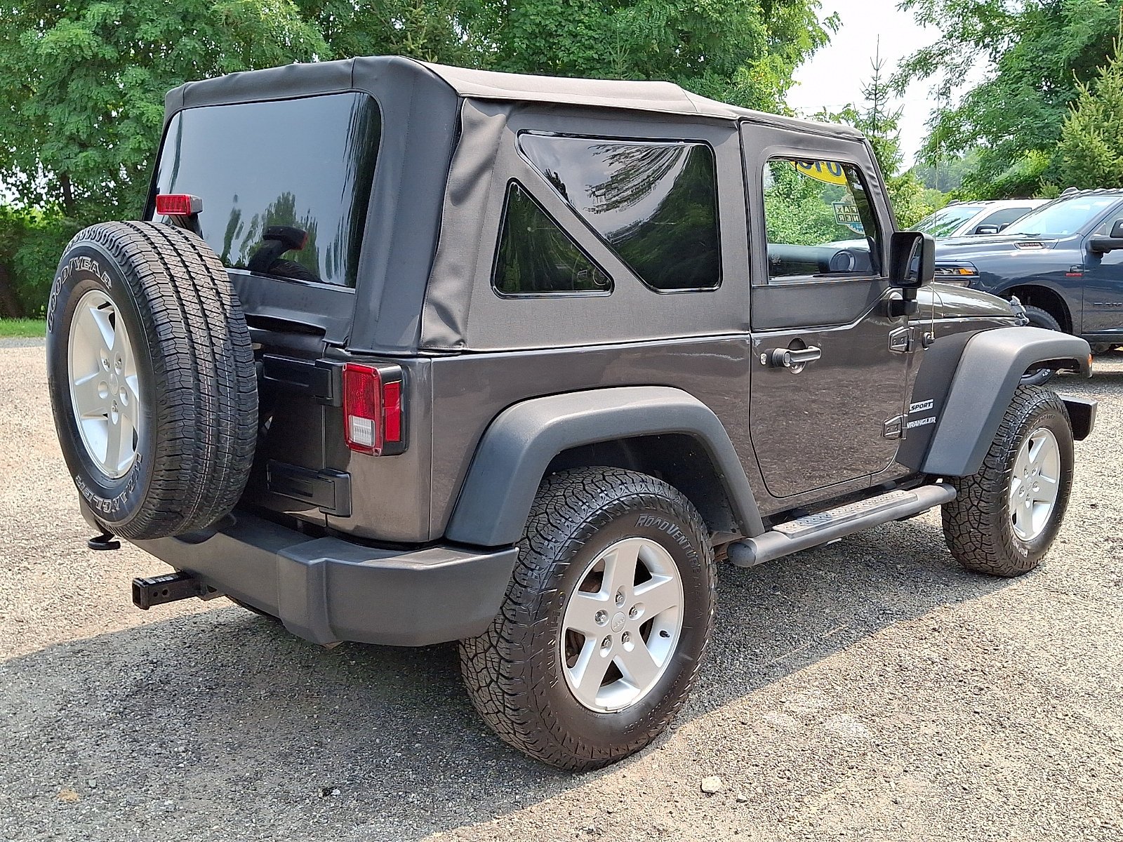 Used 2016 Granite Crystal Metallic Clearcoat Jeep Sport image 6