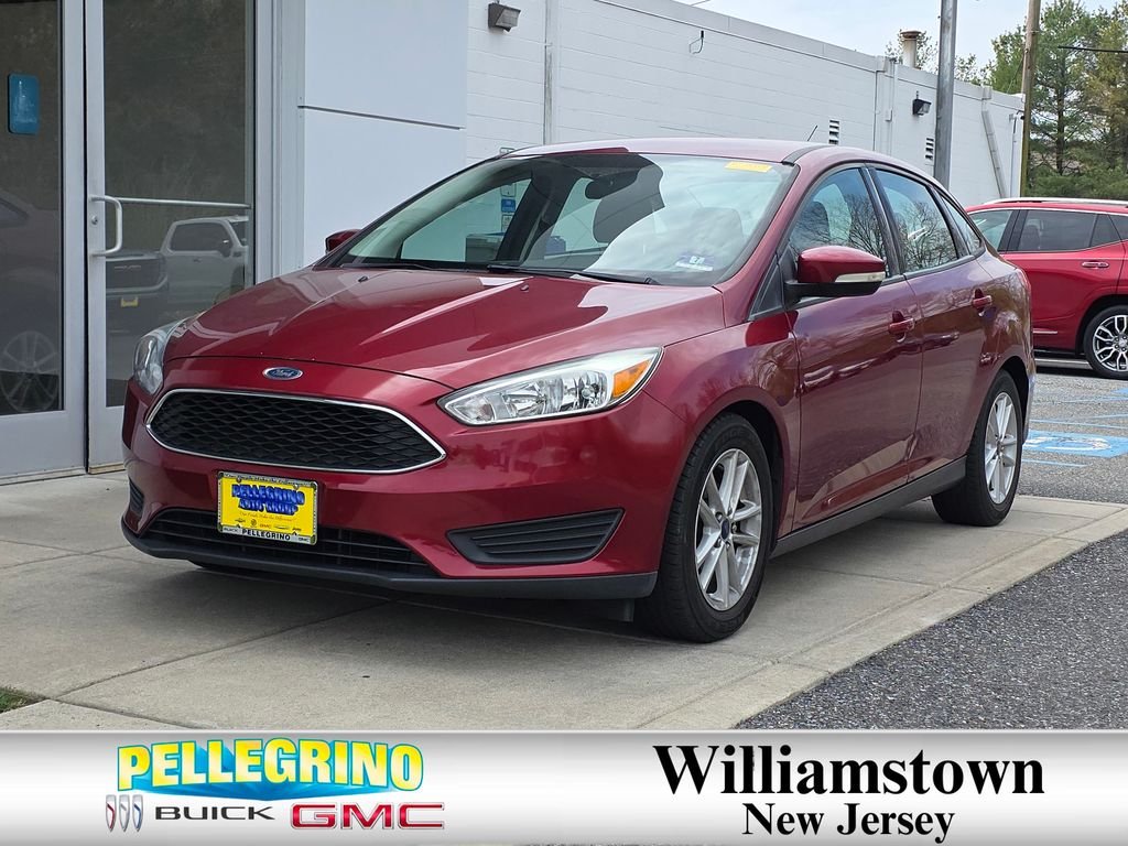 Red 2015 Ford Focus SE Sedan Front-Wheel Drive
