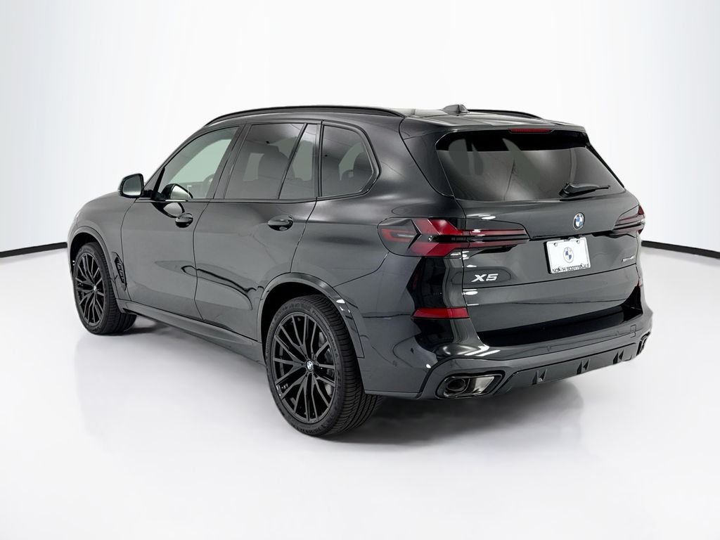 New 2026 Black Sapphire Metallic BMW sDrive40i image 7