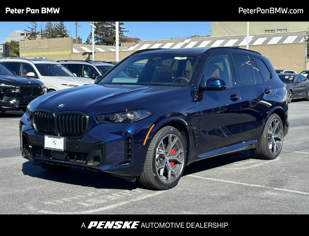New 2026 Tanzanite Blue II Metallic BMW xDrive50e image 1