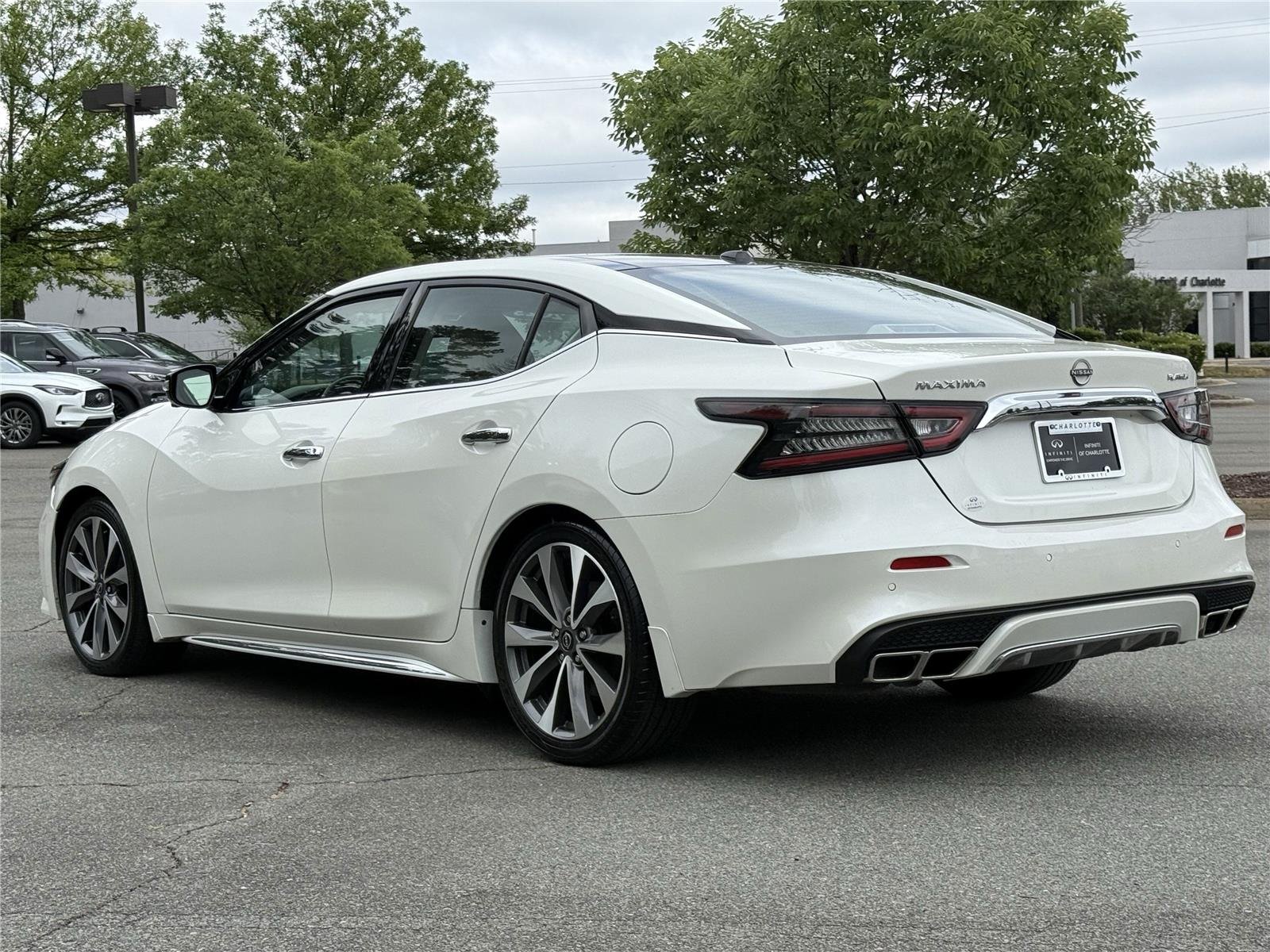 Used 2023 Pearl White Tricoat Nissan Platinum image 24