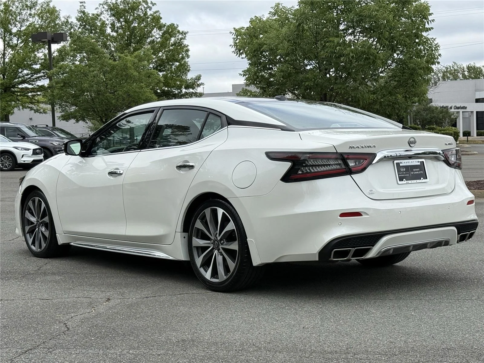 Used 2023 Pearl White Tricoat Nissan Platinum image 24