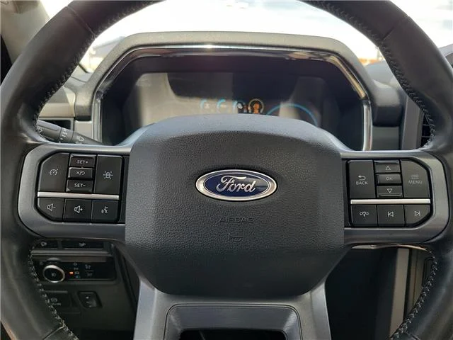 Used 2023 Agate Black Metallic Ford Lariat 4x4 SuperCrew Cab 6.5 ft. box 157 in. WB image 18