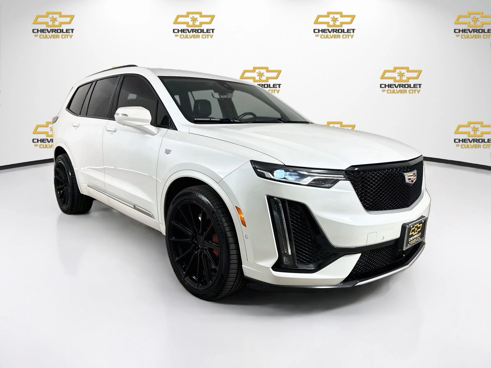 Used 2022 CRYSTAL WHITE TRICOAT Cadillac Sport image 1