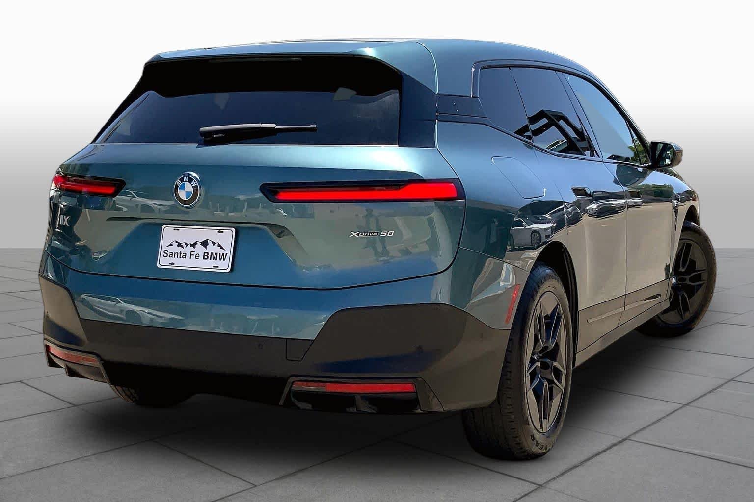 Used 2024 Blue Ridge Mountain Metallic BMW xDrive50 image 12