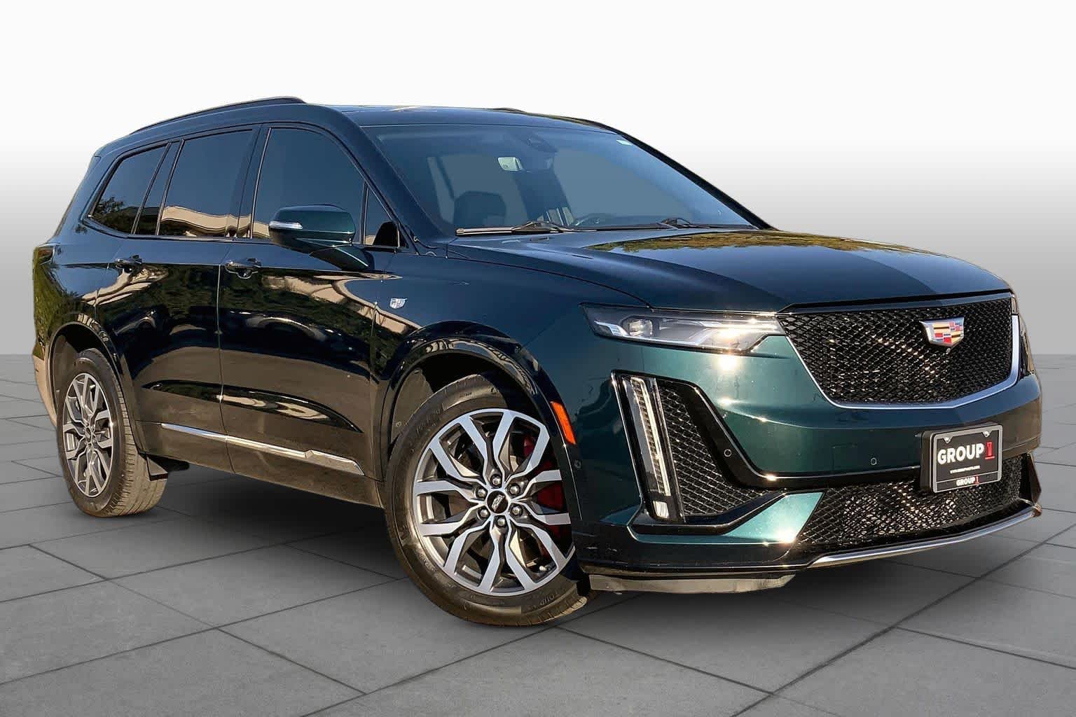Used 2024 Emerald Lake Metallic Cadillac AWD Sport image 3