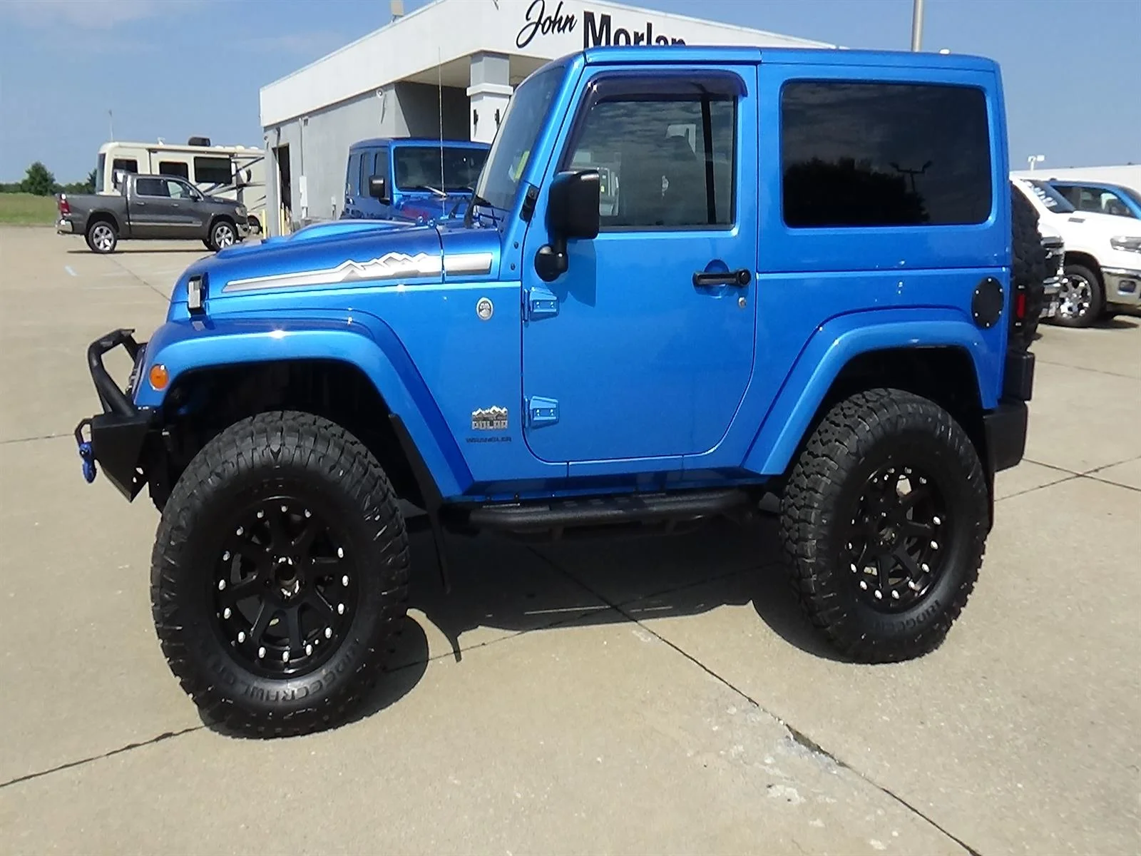 Used 2014 Hydro Blue Pearl Coat Jeep Polar Edition image 1