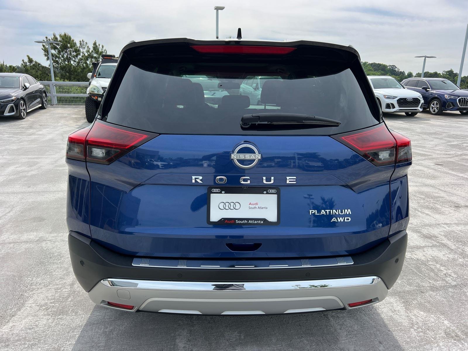 Used 2023 Caspian Blue Metallic/Super Black Nissan Platinum image 6
