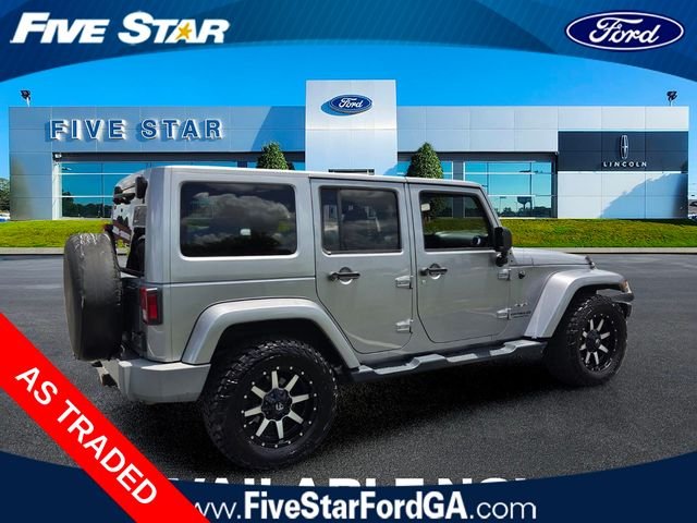 Used 2016 Silver Jeep Unlimited Sahara image 11