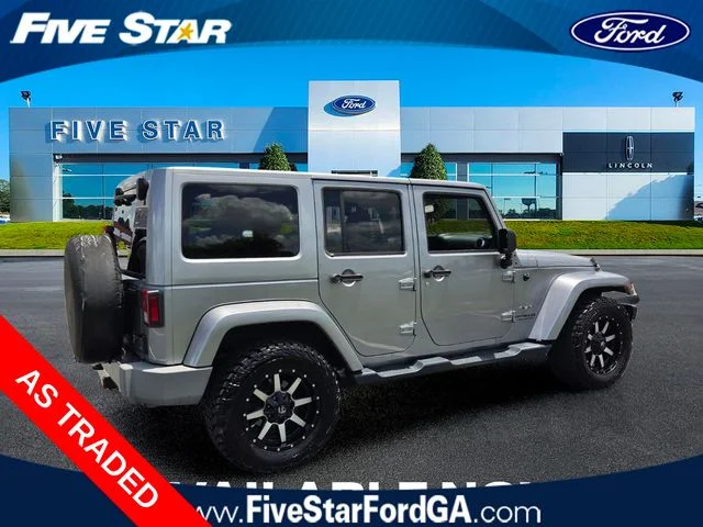Used 2016 Silver Jeep Unlimited Sahara image 11
