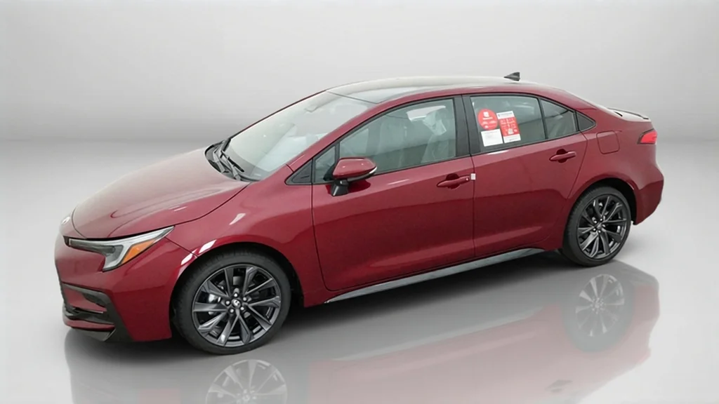 New 2027 Ruby Flare Pearl with Inked roof Toyota SE image 3
