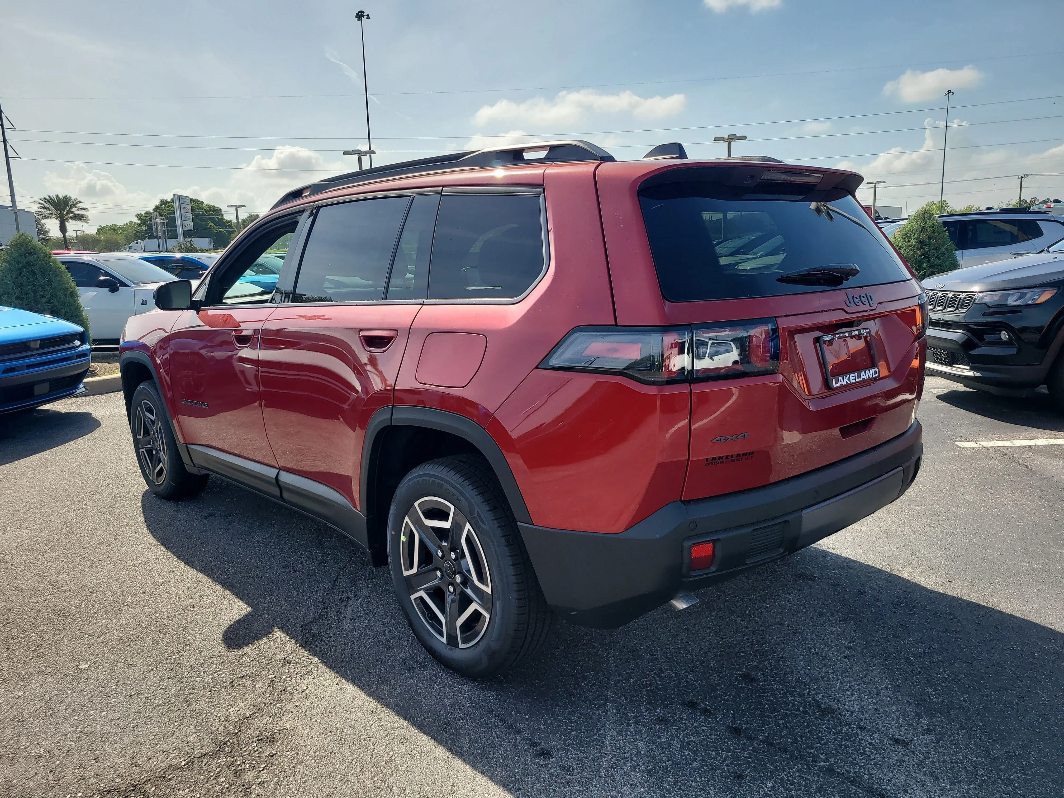 New 2026 Red Hot Pearlcoat Jeep Laredo image 8