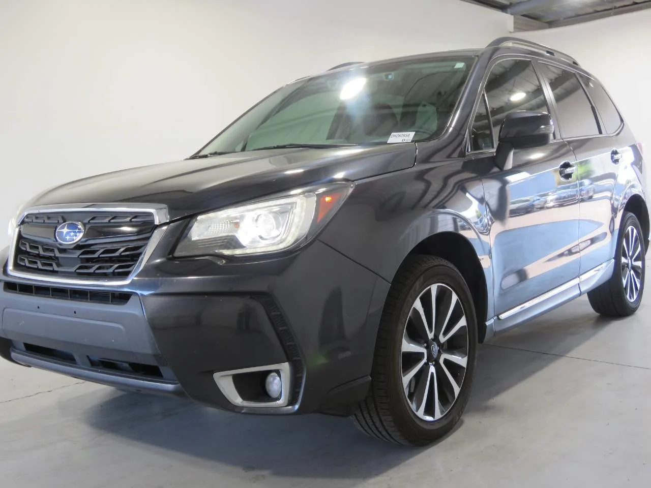 Used 2018 Crystal Black Silica Subaru 2.0XT Touring image 1