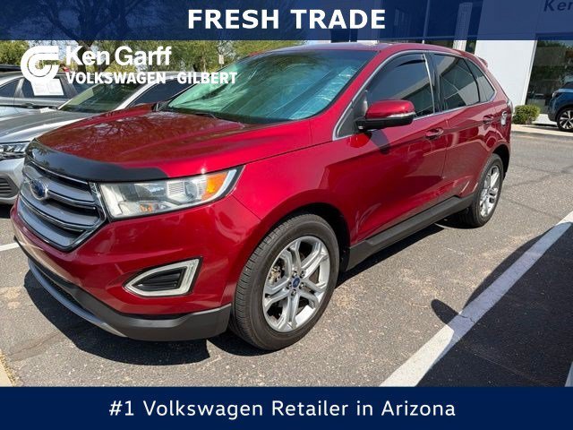 Used 2016 Ruby Red Metallic Ford Titanium image 1