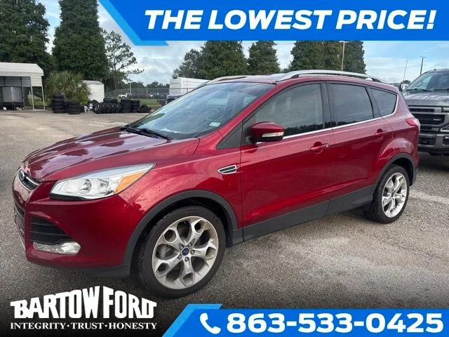 Used 2015 Red Ford Titanium image 1