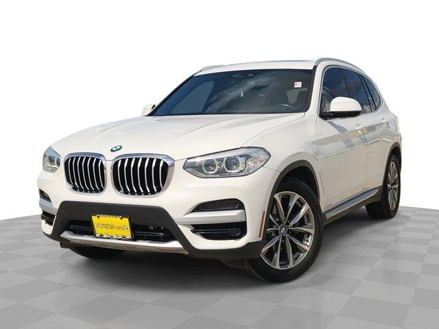 Used 2019 White BMW sDrive30i image 1
