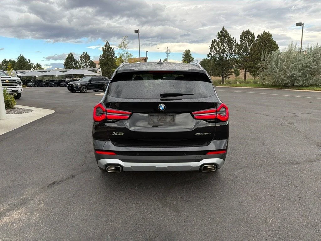 Used 2024 Black Sapphire Metallic BMW xDrive30i image 4