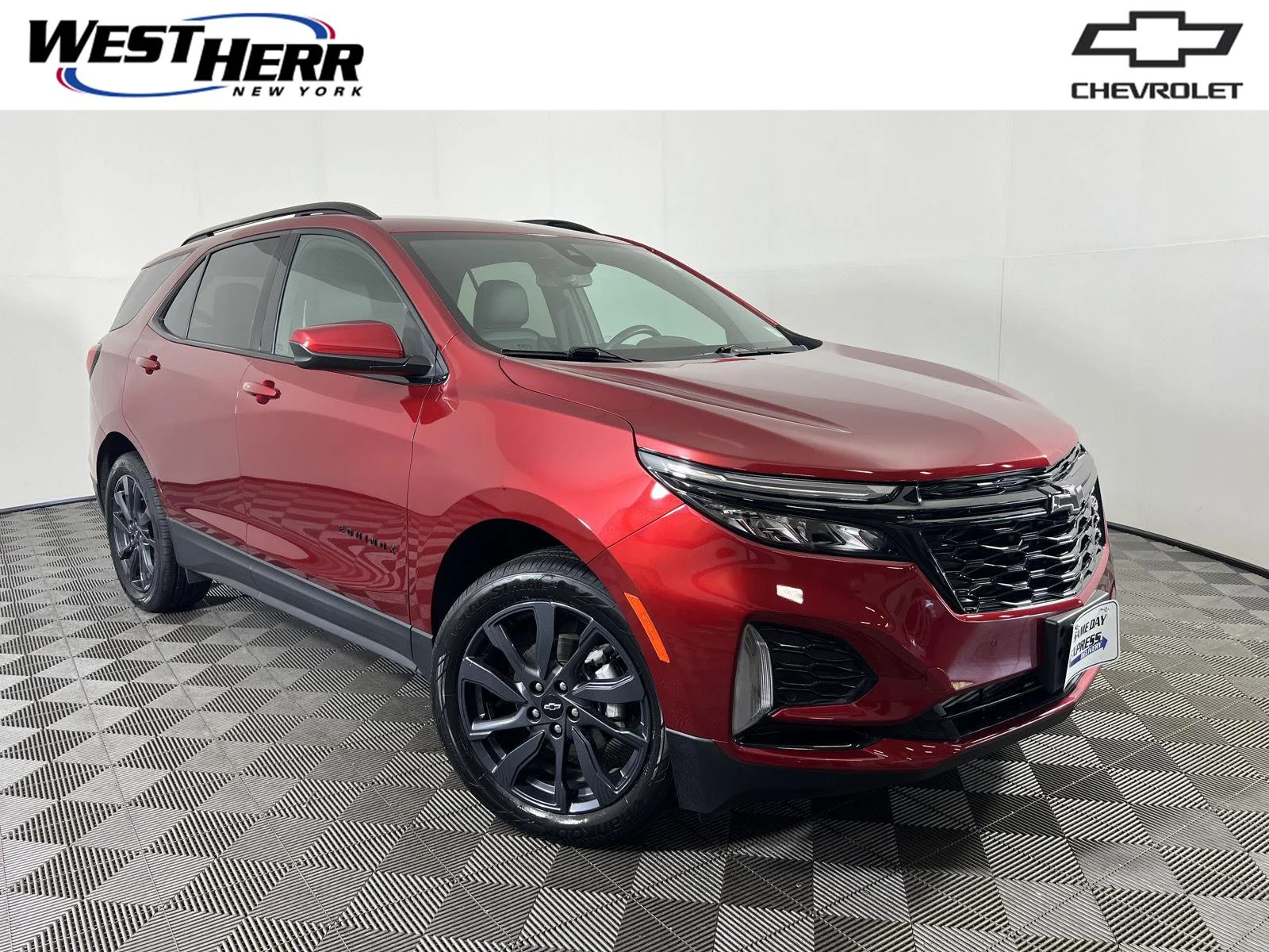 Used 2024 Radiant Red Tintcoat Chevrolet RS image 1