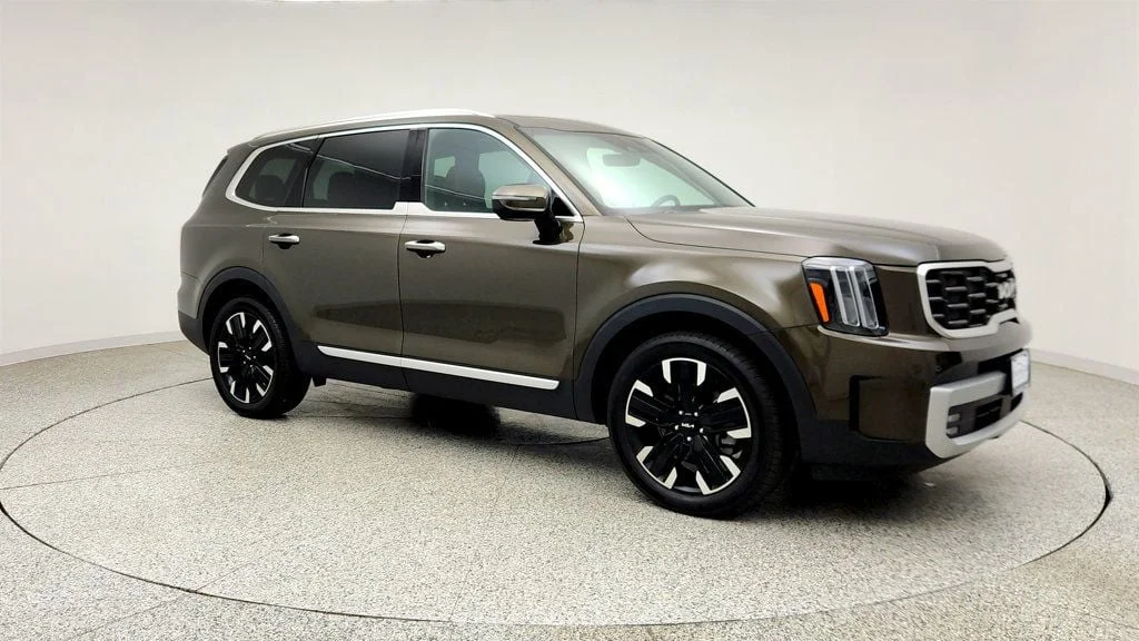 Used 2025 Dark Moss Kia SX AWD w/ Captain
