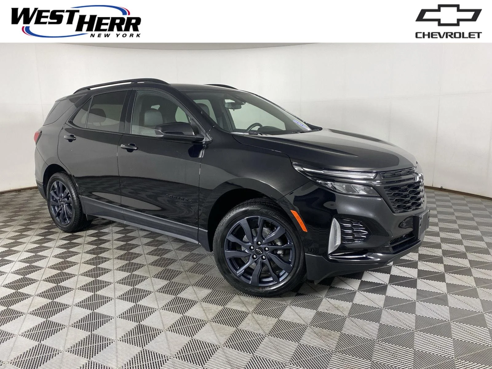 Used 2024 Mosaic Black Metallic Chevrolet RS image 1