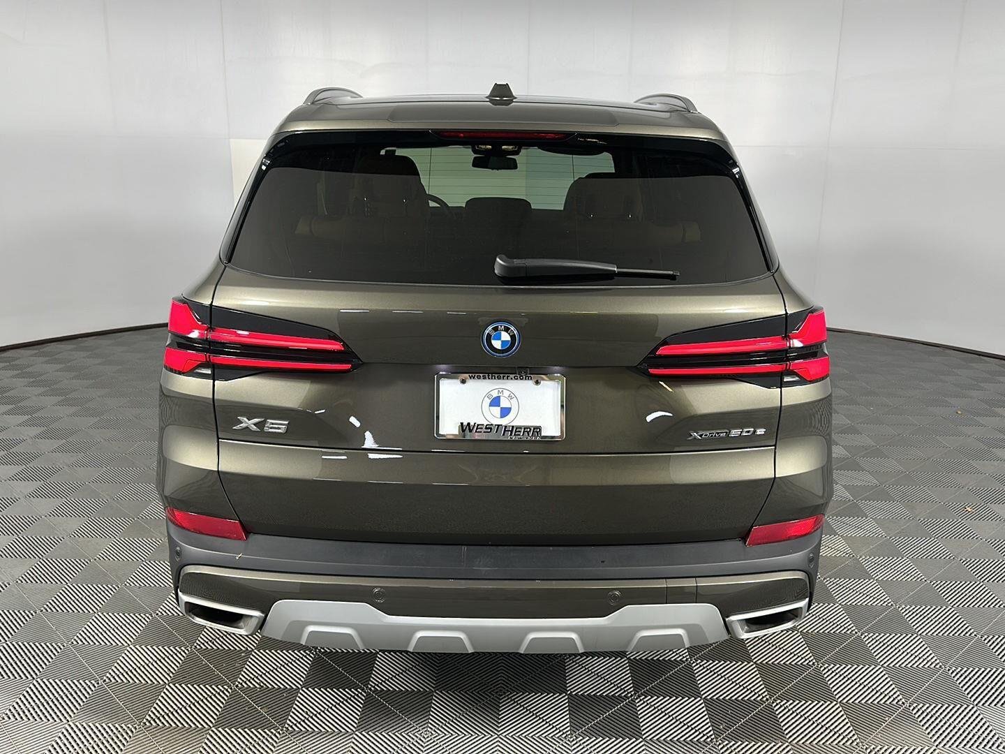 New 2026 Manhattan Green Metallic BMW xDrive50e image 6