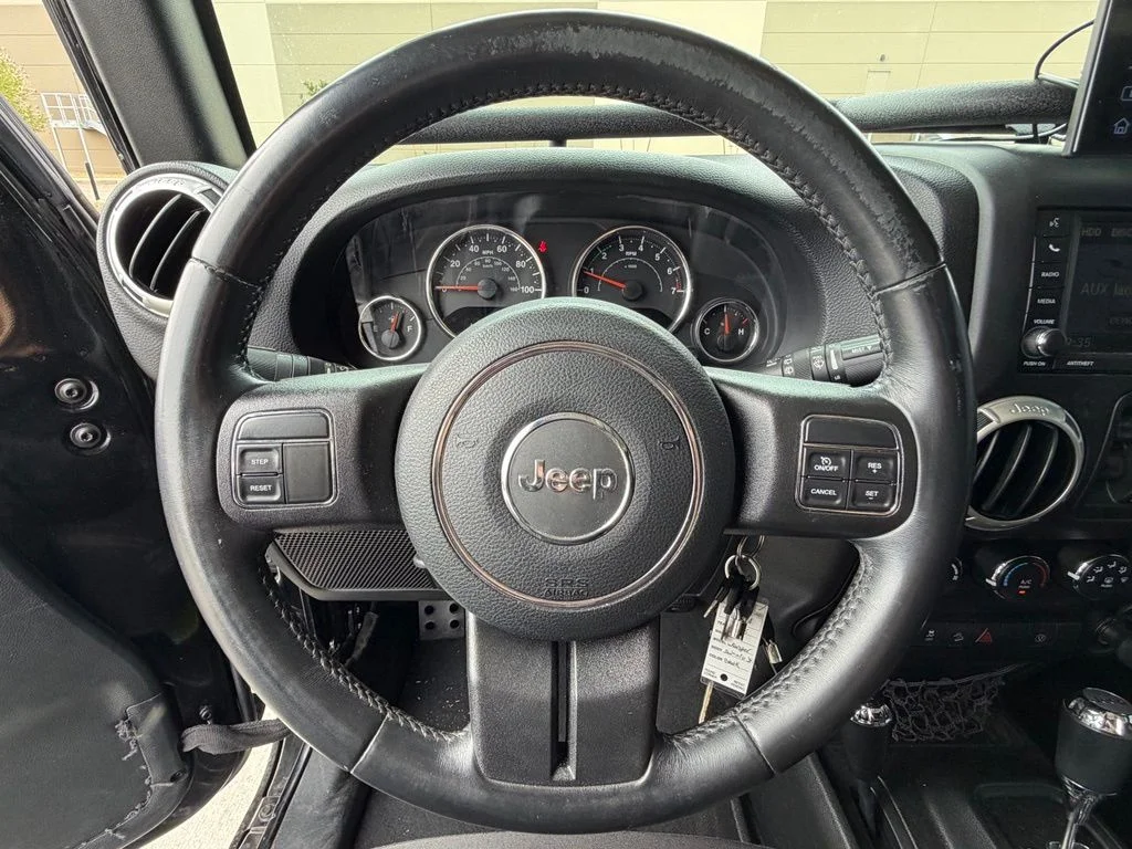 Used 2018 Black Jeep Unlimited Sahara image 13
