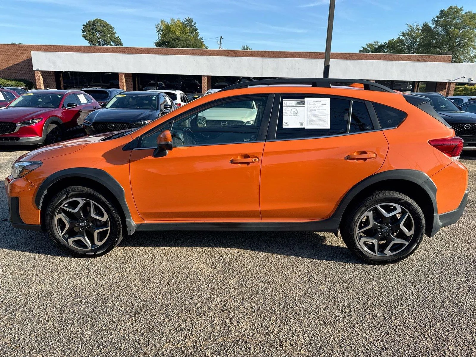 Used 2019 Sunshine Orange Subaru Limited image 19