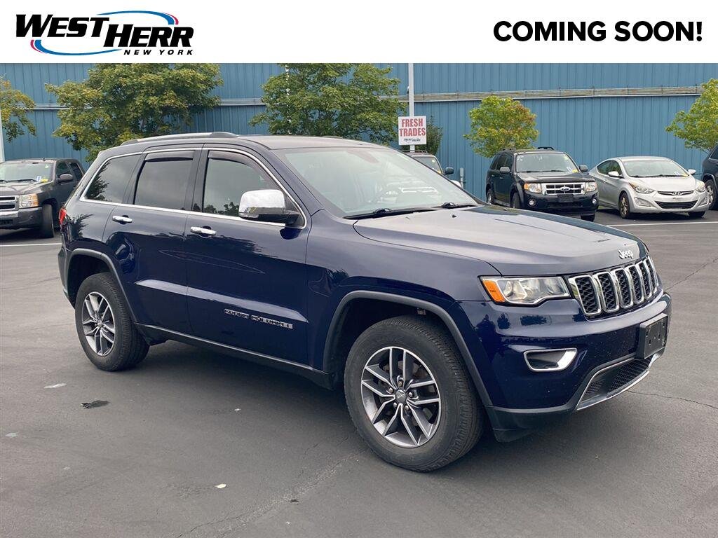 Used 2018 True Blue Pearlcoat Jeep Limited image 1