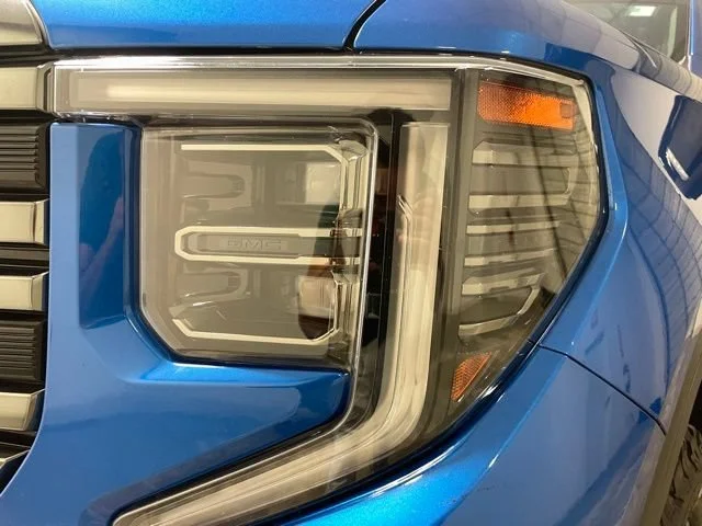 Used 2024 Dynamic Blue Metallic GMC AT4 image 4