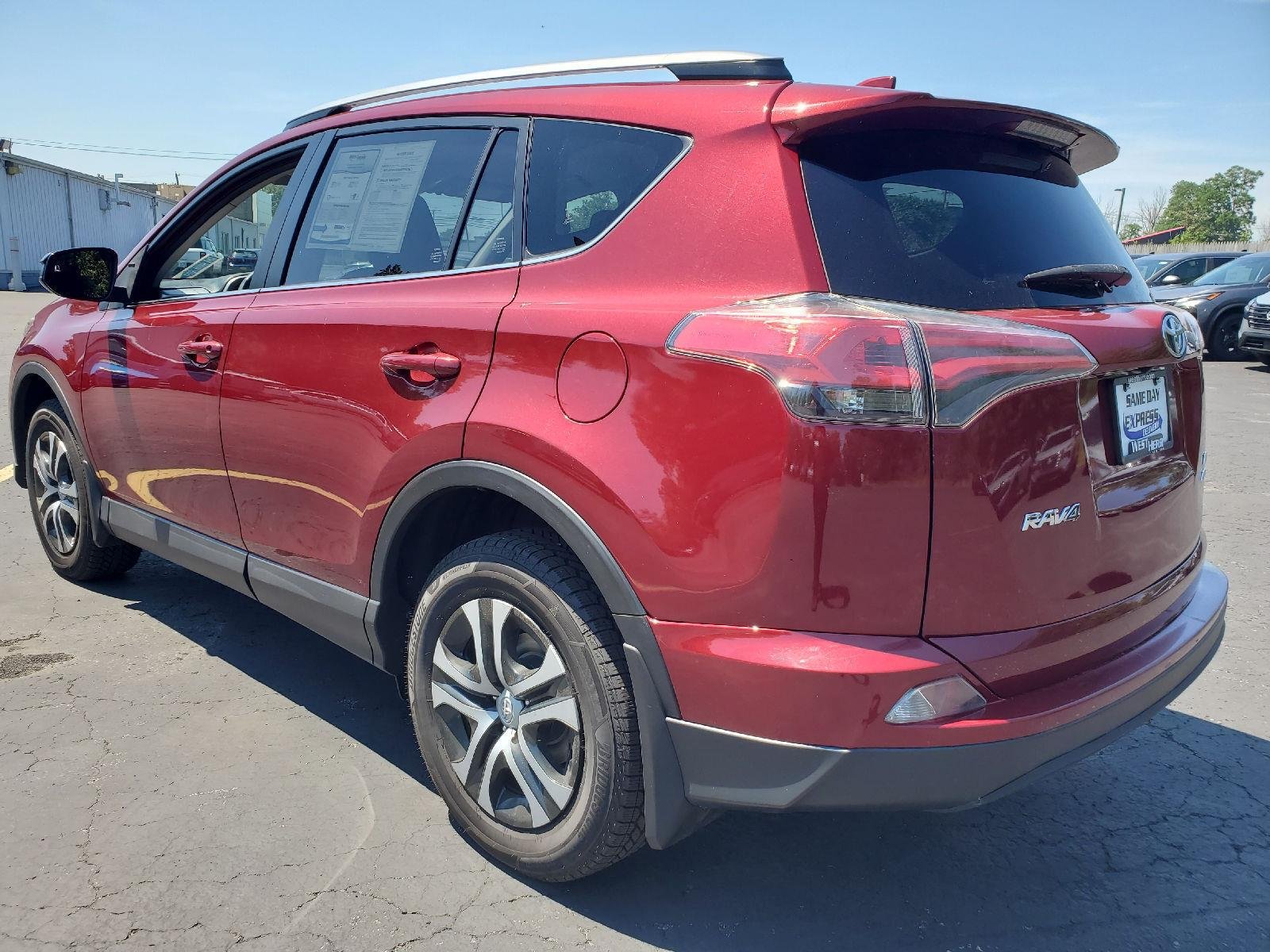 Used 2018 Ruby Flare Pearl Toyota LE image 3