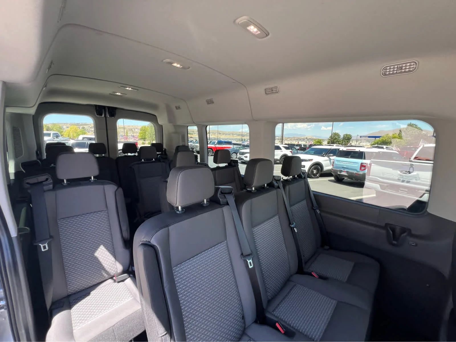 New 2026 Ingot Silver Metallic Ford Passenger Van XLT image 24