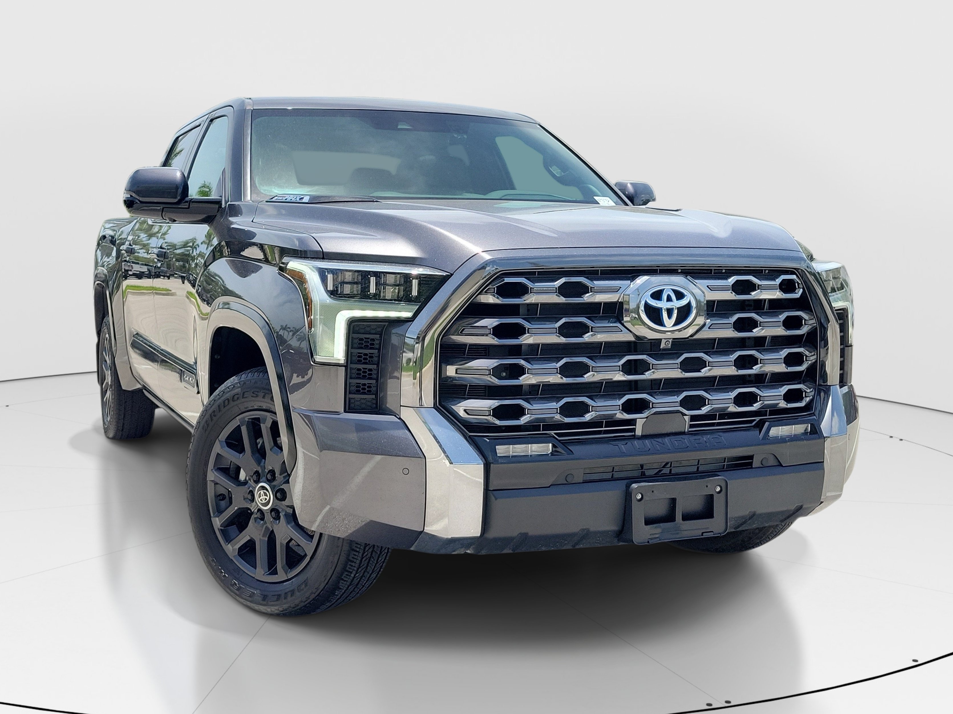 Used 2024 Magnetic Gray Metallic Toyota Platinum Hybrid image 2