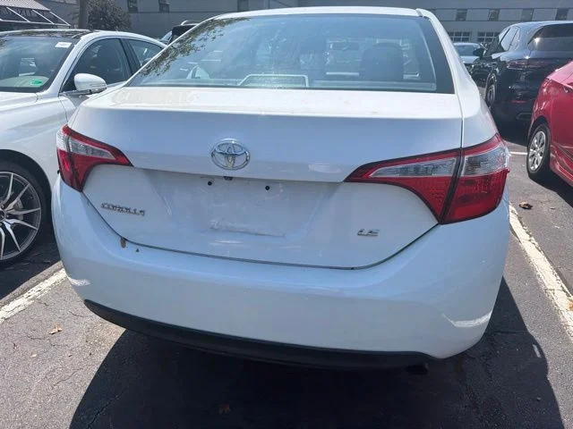 Used 2016 Super White Toyota LE image 7