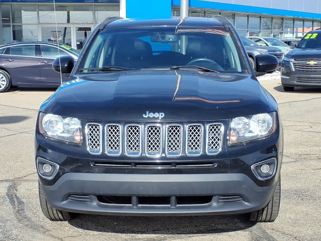 Used 2016 Jeep Compass High Altitude with VIN 1C4NJDEB1GD768755 for sale in Fowlerville, MI