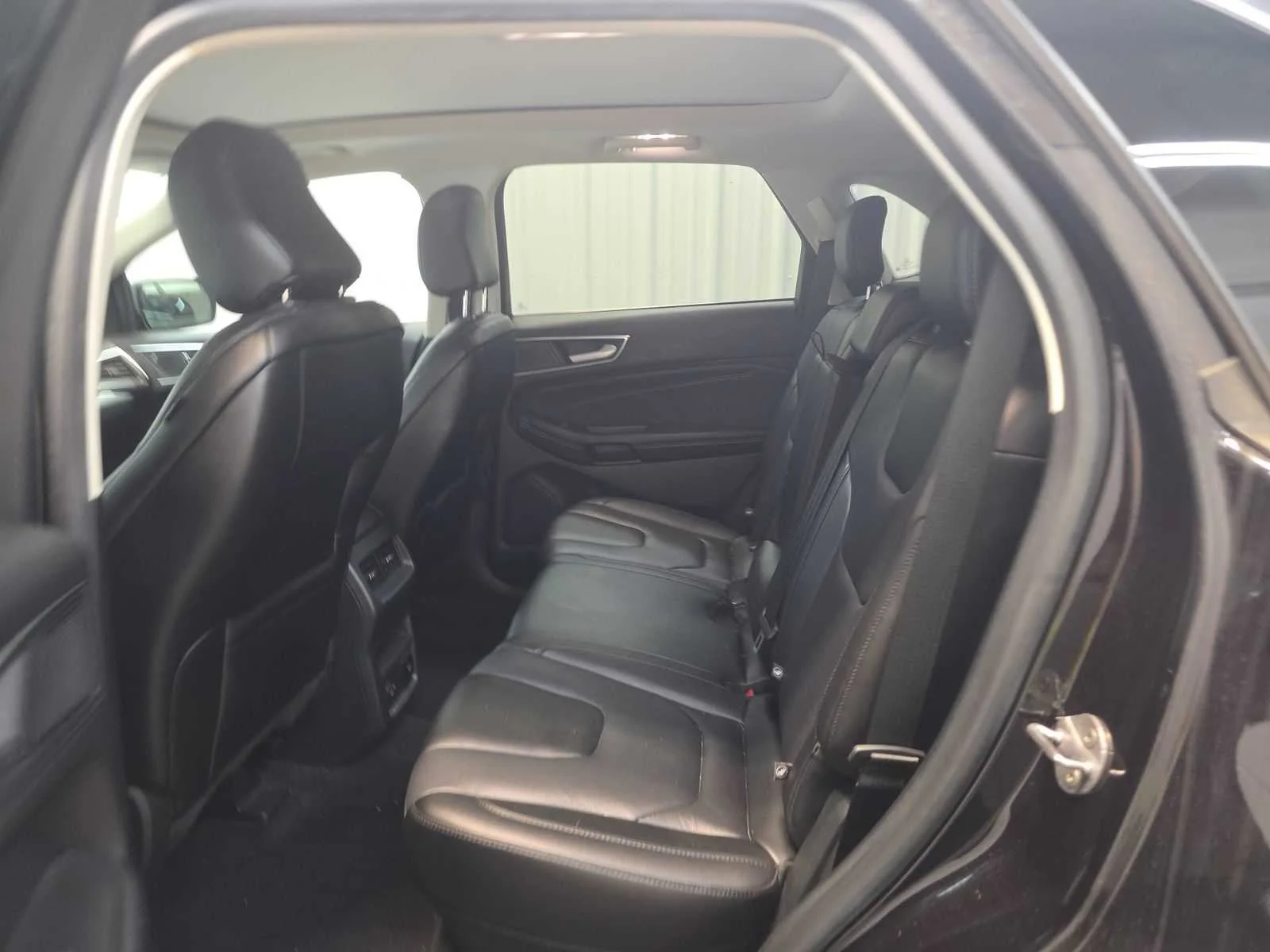 Used 2021 Agate Black Metallic Ford Titanium image 11