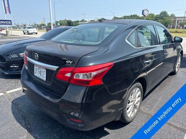 Used 2018 Super Black Nissan SV image 5