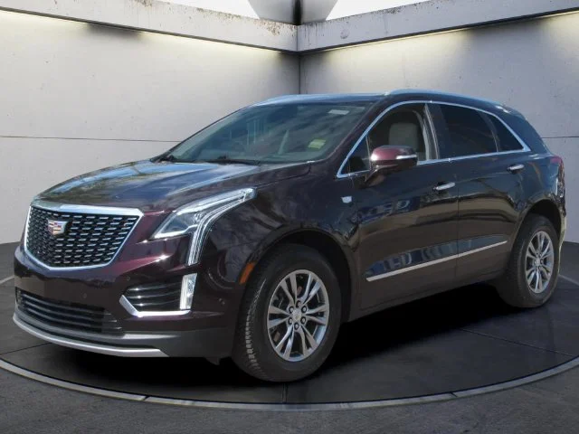 Used 2021 Garnet Cadillac Premium Luxury image 1
