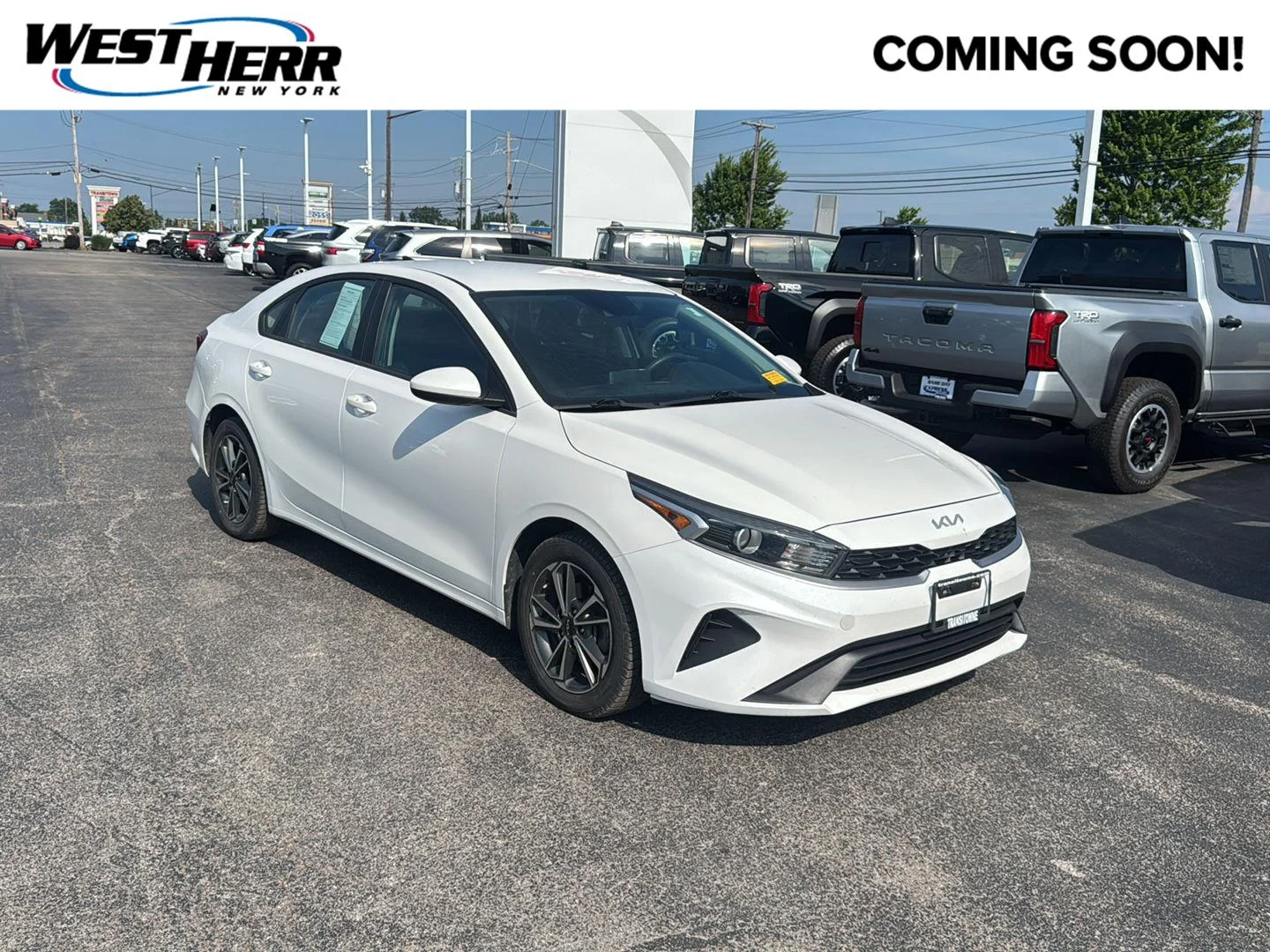 Used 2023 Snow White Pearl Kia LXS image 1