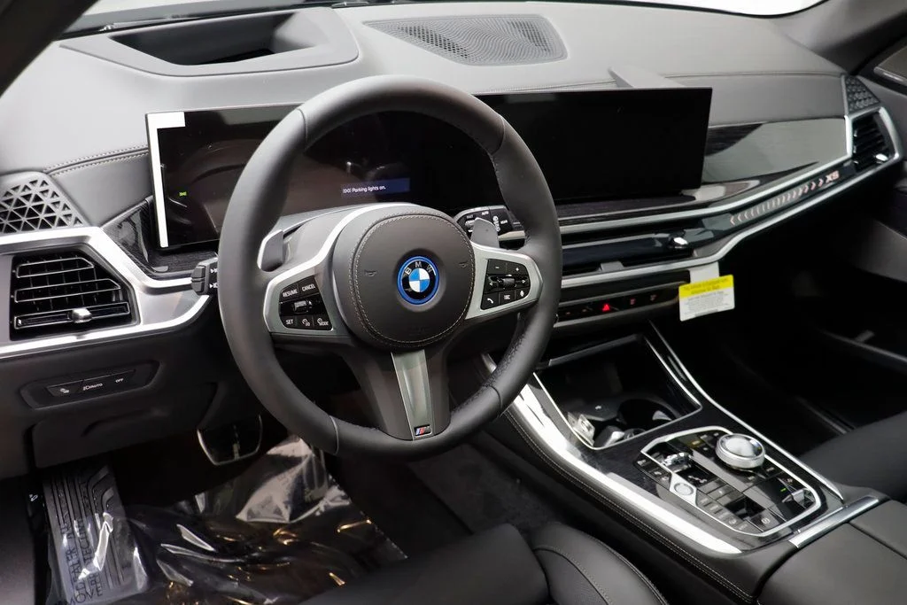 New 2026 Black BMW xDrive50e image 7