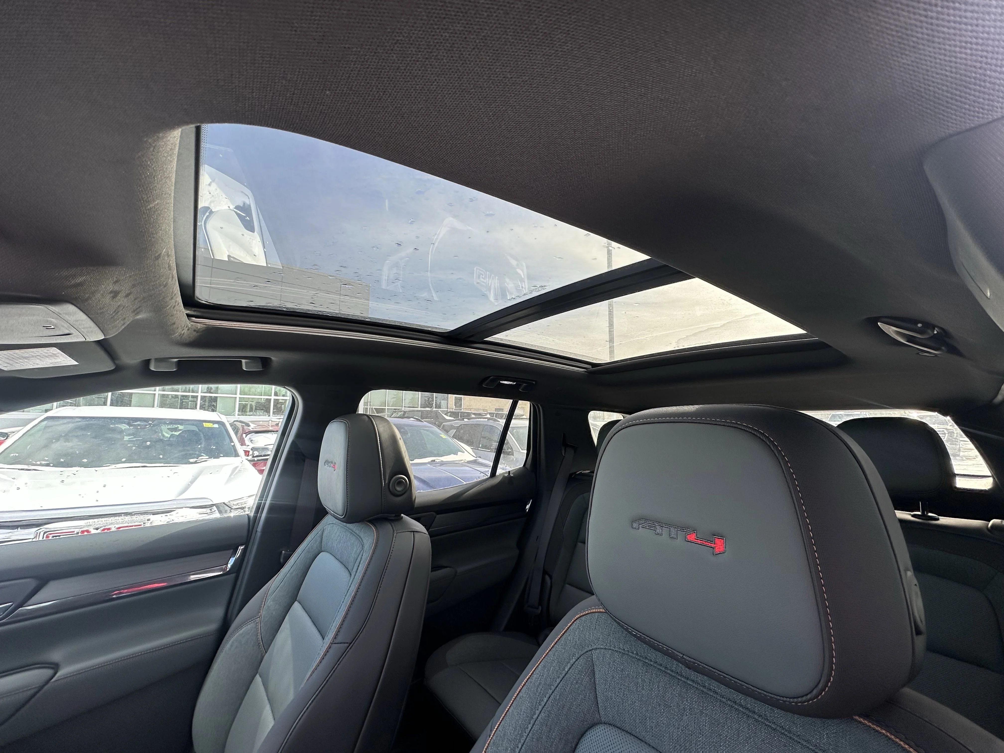 New 2026 Summit White GMC AWD AT4 image 17