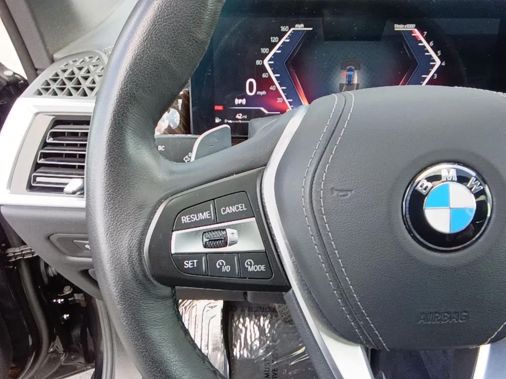 Certified Used 2025 Black Sapphire Metallic BMW xDrive40i image 15