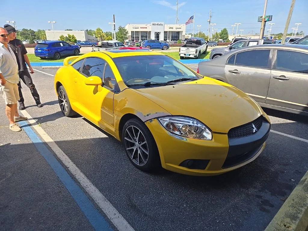 Used 2009 Yellow Mitsubishi GT image 1