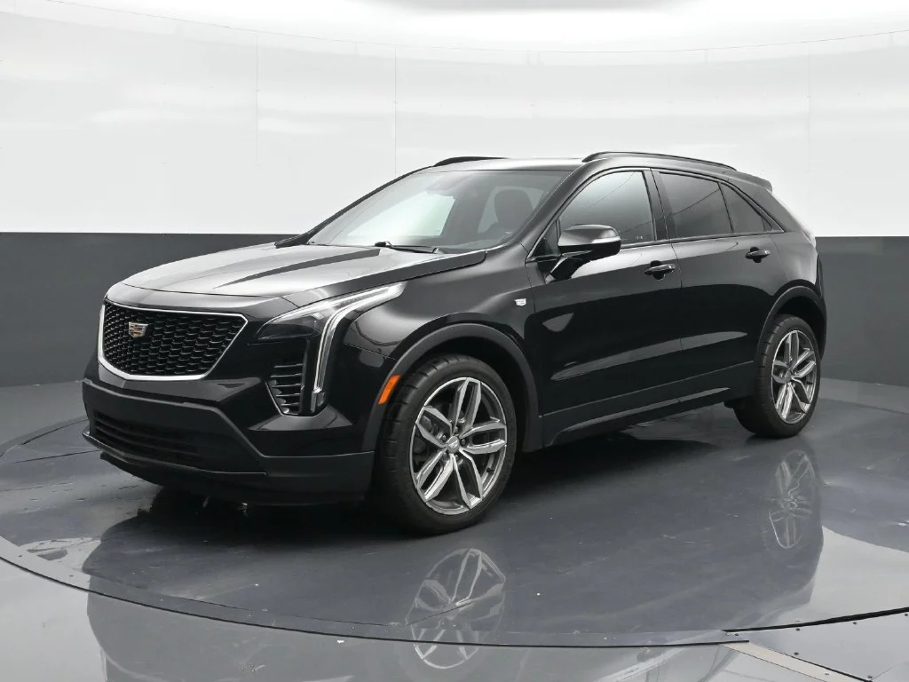 Used 2023 Black Cadillac Sport image 1
