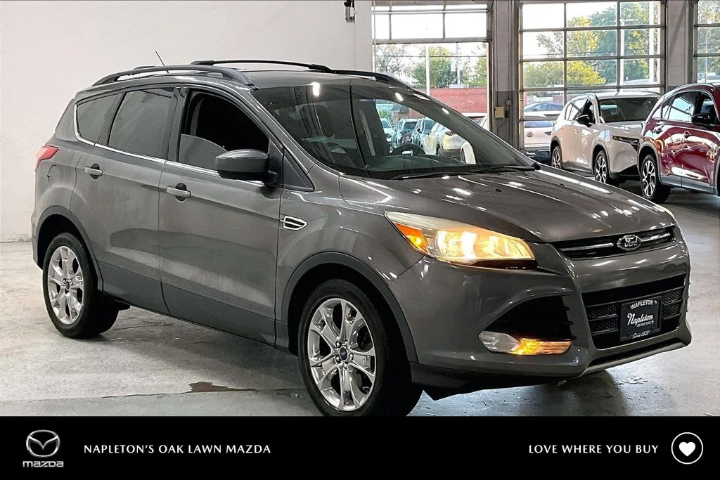 Used 2014 Gray Ford SE image 1