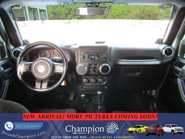Used 2012 Silver Jeep Unlimited Sahara image 9