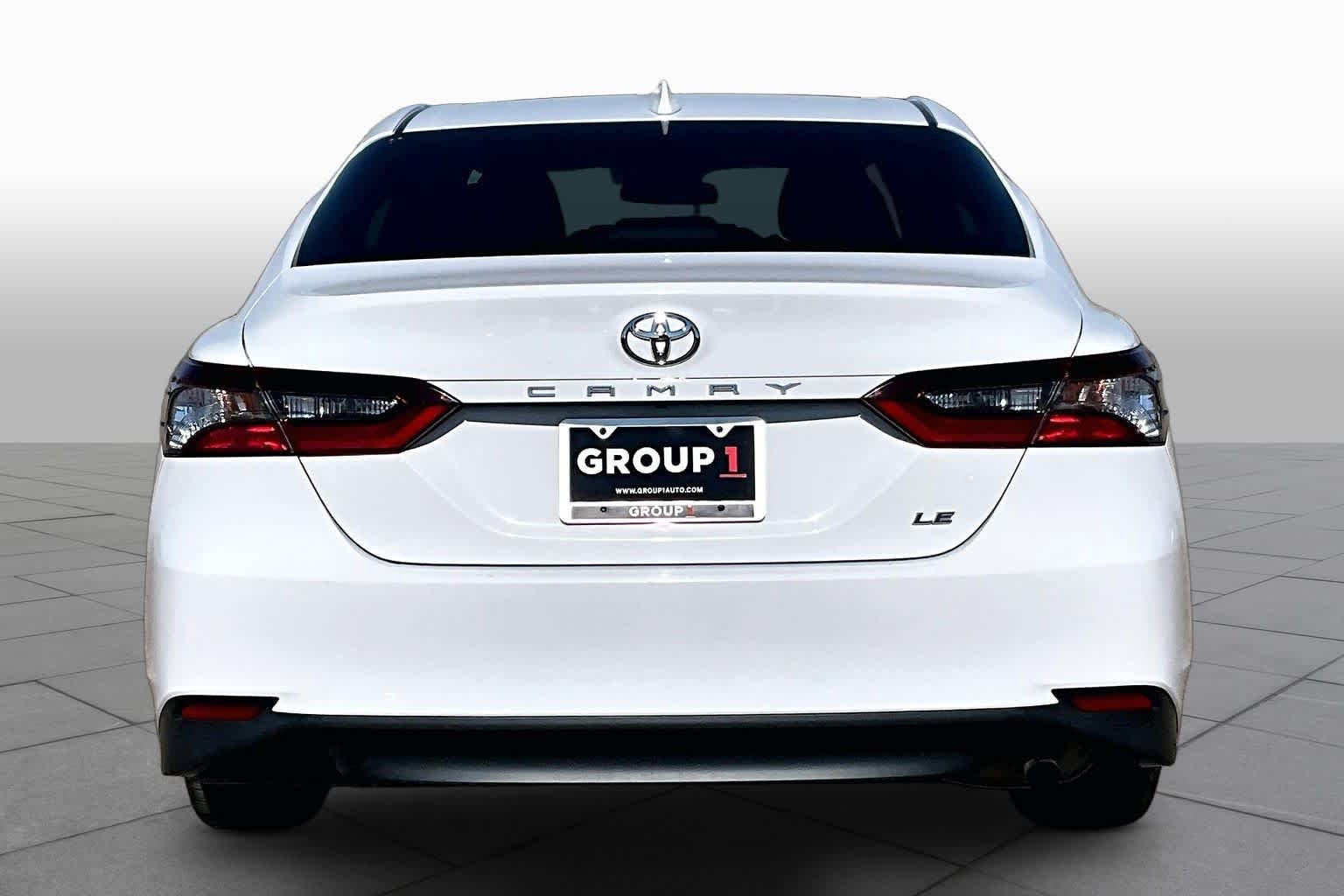 Used 2021 Super White Toyota LE image 5