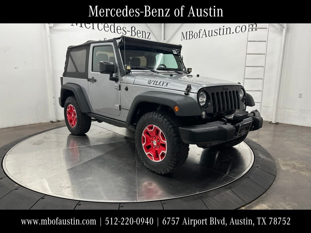 Used 2015 Silver Jeep Sport image 1