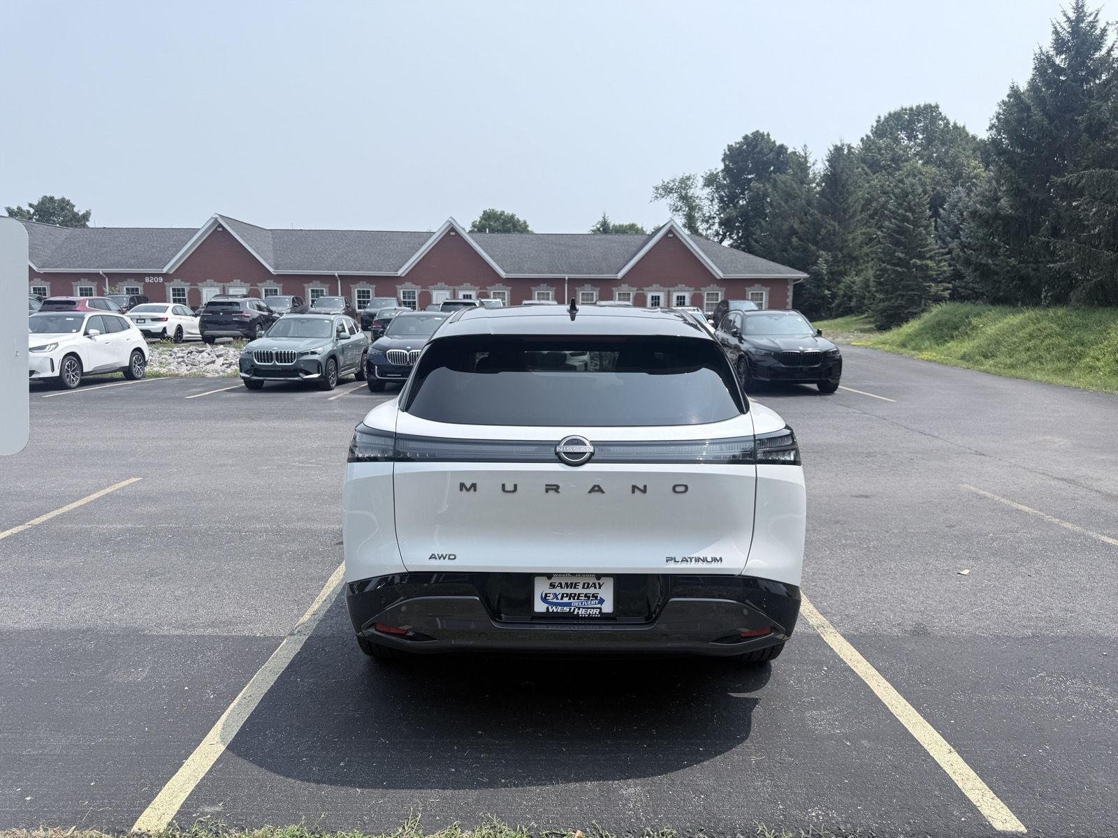 Used 2025 Everest White Pearl Tricoat/Super Black Nissan Platinum image 6