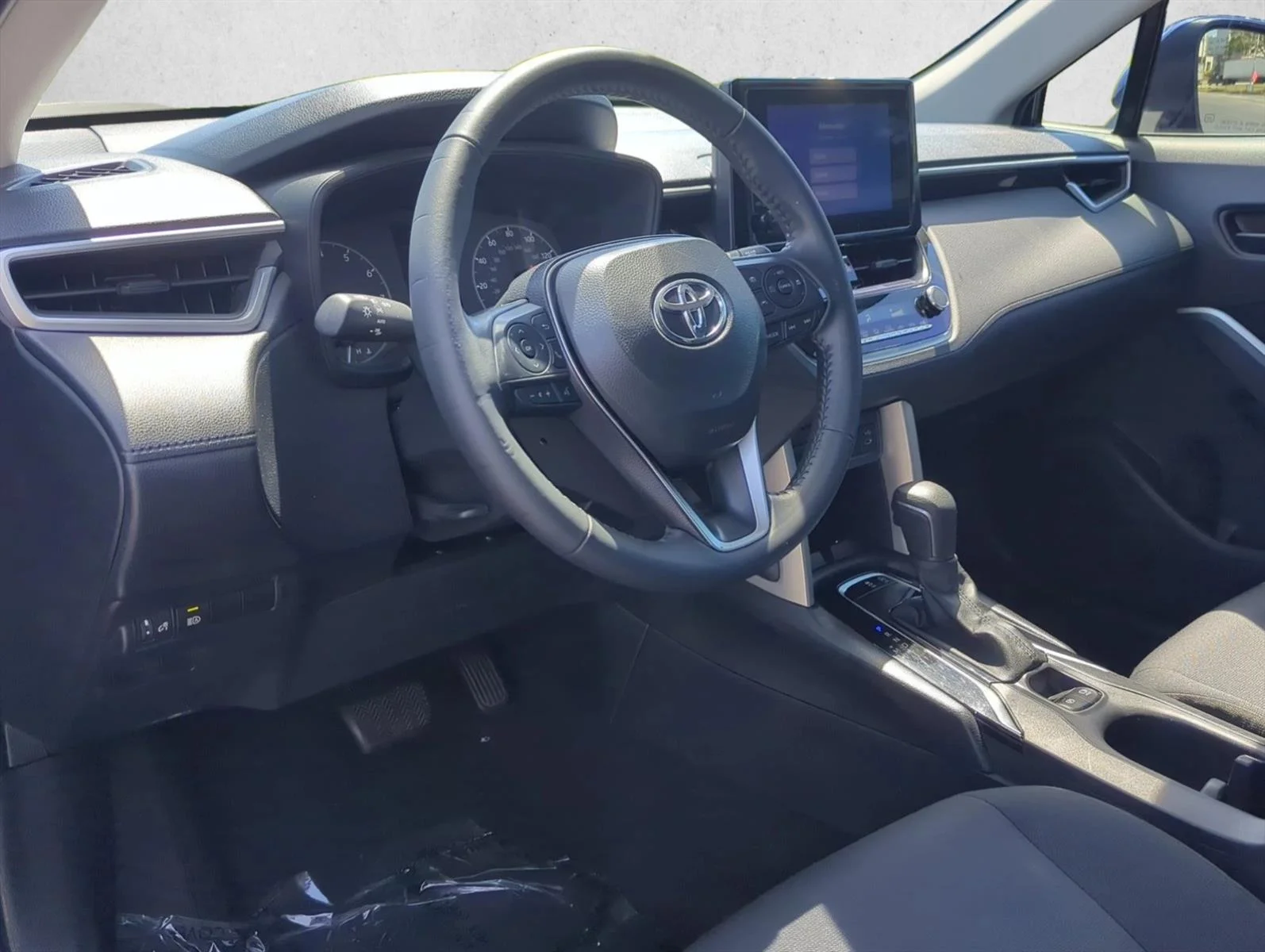 Used 2024 Blue Crush Metallic Toyota LE image 9