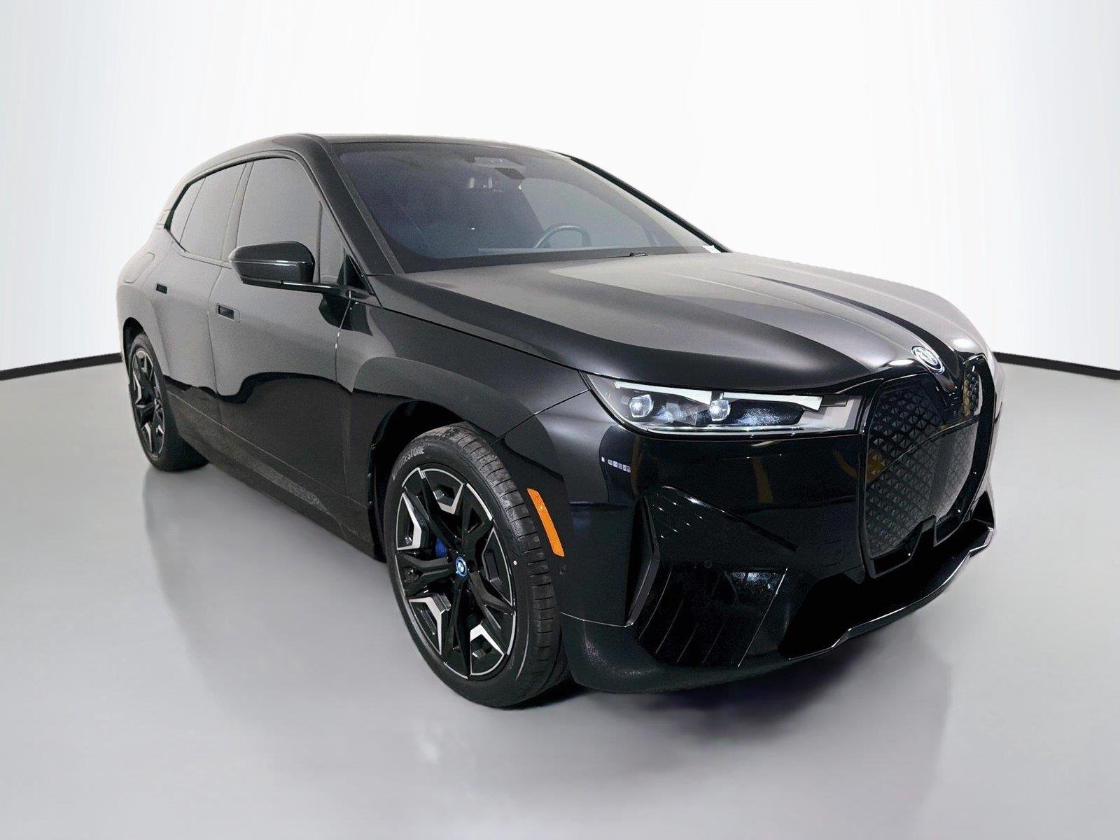 Used 2024 Black Sapphire Metallic BMW xDrive50 image 3